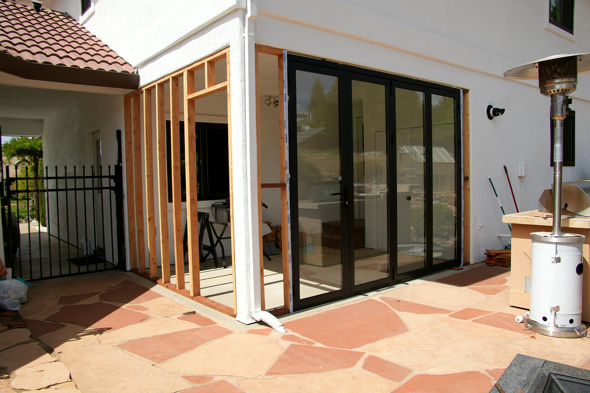 Completed black aluminum bifold door installation in El Dorado Hills